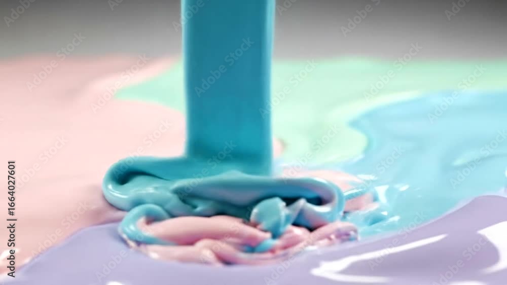 Aufkleber a close-up view of pastel-colored liquids mixing and flowing into each other, creating a visually ca