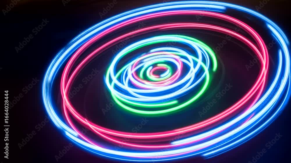 Poster vibrant concentric circles of neon light create a dynamic, swirling pattern against a dark backgroun