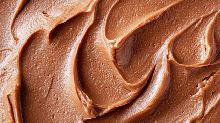 Close up texture of creamy chocolate spread background, smooth sweet cocoa hazelnut paste surface, delicious dessert ingredient pattern