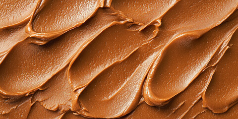 Close up texture of creamy chocolate spread background, smooth sweet cocoa hazelnut paste surface, delicious dessert ingredient pattern
