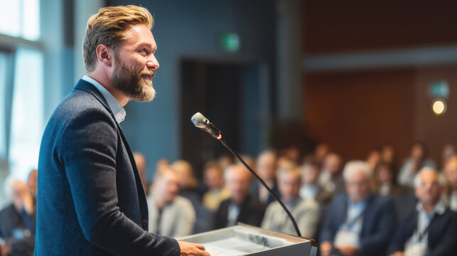 Confident speaker addresses audience conference, sharing insights and engaging with attendees. atmosphere is professional and focused, highlighting importance of communication business setting