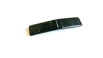 Modern Black TV Remote on a White Background.