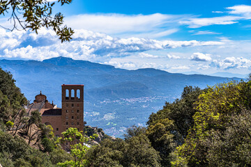 Stunning view of Santa Maria de Montserrat Monastery on Montserrat Mountain Montserrat Natural Park on a sunny spring day, Monistrol de Montserrat, Catalonia, Spain