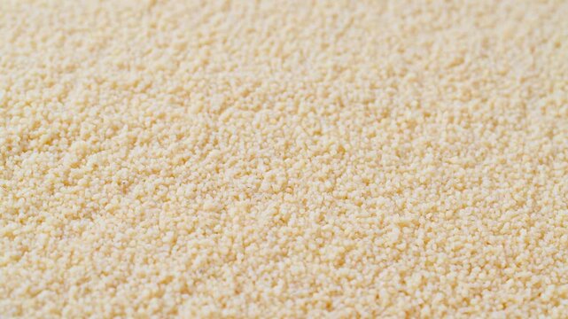 Organic couscous background, close-up .
Close-up of couscous, macro shot.