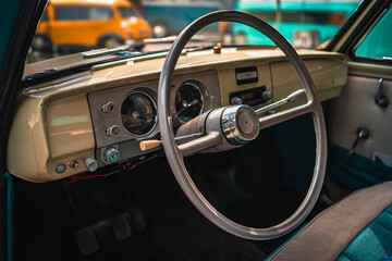 Vintage car dashboard close-up with retro design and classic details. Perfect for automotive...