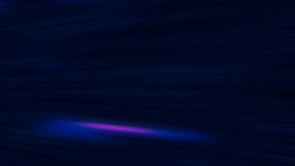 Dynamic abstract blue light streaks creating a sense of speed and motion in darkness