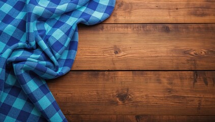 Blue checkered cloth draped casually upon rustic wooden table surface, evoking Oktoberfest atmosphere featuring warm natural lighting and textured wood grain details