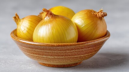 Yellow Onion in a Bowl on a White Background with Space for Copy or Text