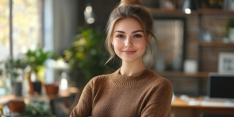 Young woman smiling confidently in a cozy indoor workspace surrounded by plants