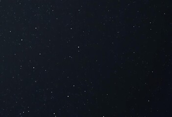 Fototapeta premium Deep, charcoal-textured backdrop with subtle white star-like speckles, white, astronomy