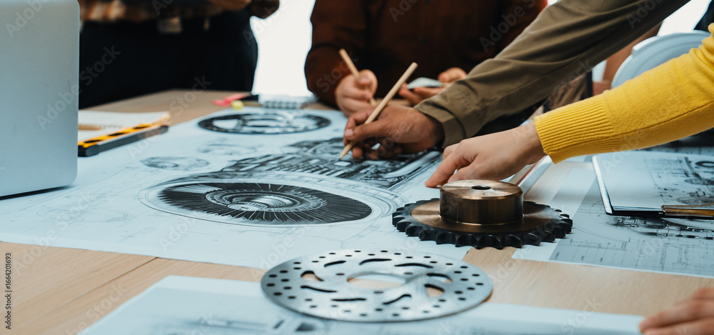 Poster a dynamic scene of a collaborative engineering design process where team members actively engage wit