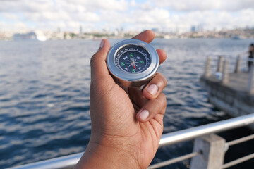 Exploring the waterfront with a compass in hand