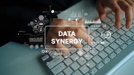 Hands Typing on Keyboard with Data Synergy Visual Elements, Technology Integration and Analytics in Modern Workspace. Asymptotic smart data analytic.