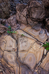 Incredible erosion patterns on rocks along the shore, Thailand