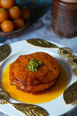 Malpua Dessert with Golden Syrup and Decorative Topping