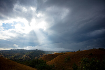 Rinca Island view with dramatic clouds