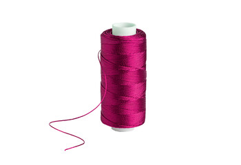 Spool of vibrant pink sewing thread isolated on transparent background
