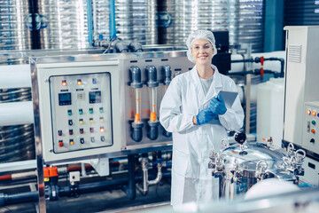 staff work in science medical lab factory check record pressure tank happy working