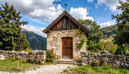 A rustic village chapel with weathered stone walls and wooden doors
