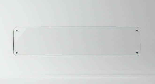 Rectangular transparent plaque mounted on a white wall with metal bolts at each corner