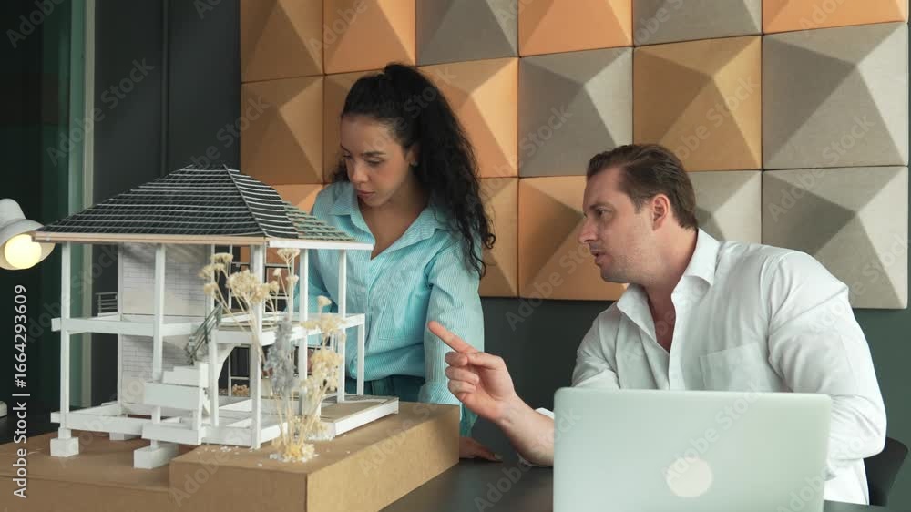 Poster two skilled professional architect engineer team discuss about house model structure. project manage