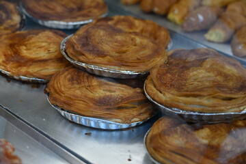 Sweet fresh buns on display in a bakery