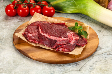 Raw beef cheeks cut for cooking