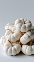 Minimalist white pumpkin arrangement in a serene corner showcasing simple autumn decor ideas for home styling