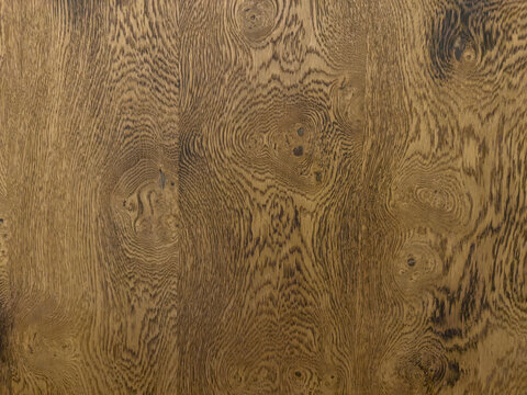 Exquisite Hardwood Close-Up: Rich Brown Wood Grain with Natural Swirls and Patterns