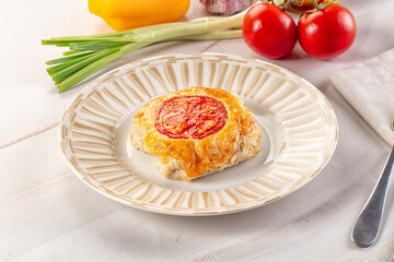 Chicken chop cutlet with cheese and tomato