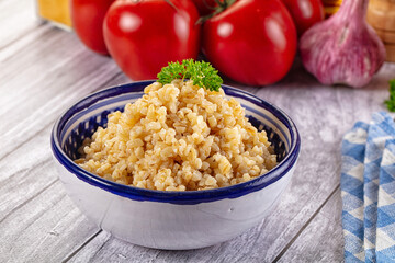 Vegan cuisine - boiled bulgur garnish