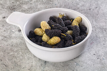 Ripe sweet juicy black and white mullberry