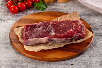 Gourmet raw rib eye steak