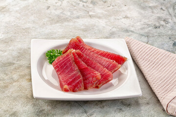 Raw red tuna sashimi slices