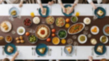 Fototapeta premium blurry image of a dining table full of food, photographed from above, traditional food is visible on the table, blurry wallpaper.