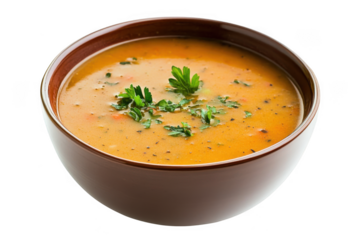 Delicious and creamy vegetable soup in brown bowl with fresh parsley topping, perfect for dinner, isolated on transparent background