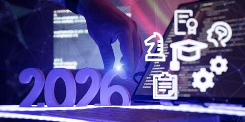 Futuristic concept showing 2026 with coding screen, education and strategy icons, symbolizing digital skills, innovation, and planning ahead.