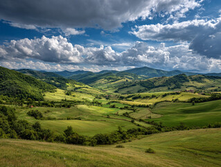 Fototapeta premium Rolling green hills and valleys under a dramatic cloudy sky