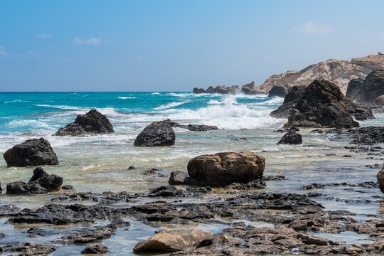 Marsa Matrouh-Egypt Aug 16, 2025: Rocks and waves, Located at Cleopatra Bath site, Marsa Matrouh city. in the North coast of Egypt.