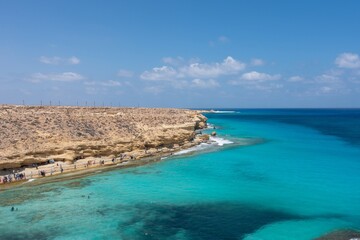 Marsa Matruh-Egypt Aug 16, 2025: Beautiful natural scenery of Ageeba Beach in marsa matrouh Egypt during daytime, Sea Shore in Sunny Day. in the North coast of Egypt