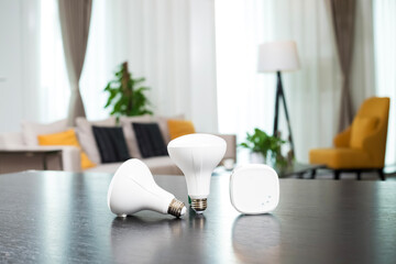 The LED energy-saving lamp is on the table