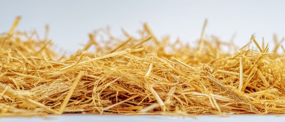 Fototapeta premium The Straw Pile Close-Up With Soft Natural Light On White Background
