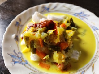 Traditional cuisine from Asia called Lontong served on Decorative Plate