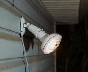 The searchlight of the small house at night