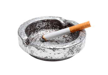 Smoking cigarette burning in metallic ashtray with ash