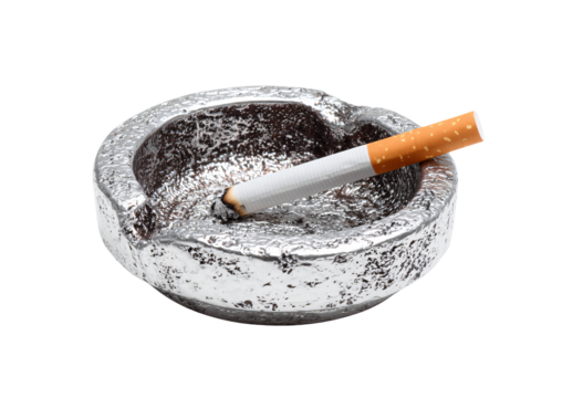 Smoking cigarette burning in metallic ashtray with ash