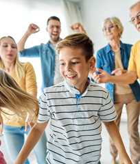 Portrait of a three generation famili, grandparents, parents and children playing and having fun...