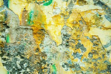 Colorful abstract background. Old, cracked, peeling paint on the wall as a background.