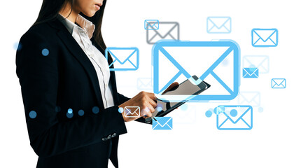 Businesswoman using tablet device with floating email icons, modern graphic style, isolated on white background, concept of digital message