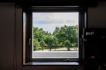 Fototapeta premium Peaceful View of Trees through a Window with Round Table